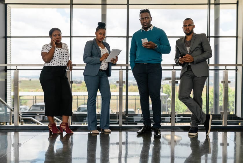 A small team working together in an office.